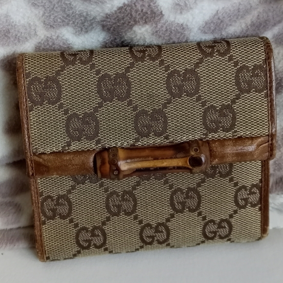 Gucci Handbags - Gucci Signature Bamboo bifold Wallet with change pocket good condition Authentic